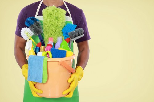 Carpet cleaning technician using safety measures in a home setting